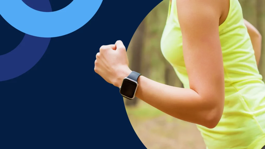 women running with an apple watch on
